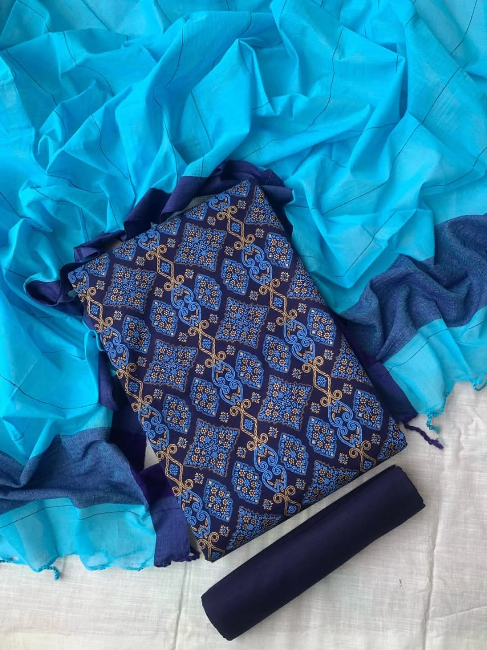 Unstitched Slub cotton three-piece.